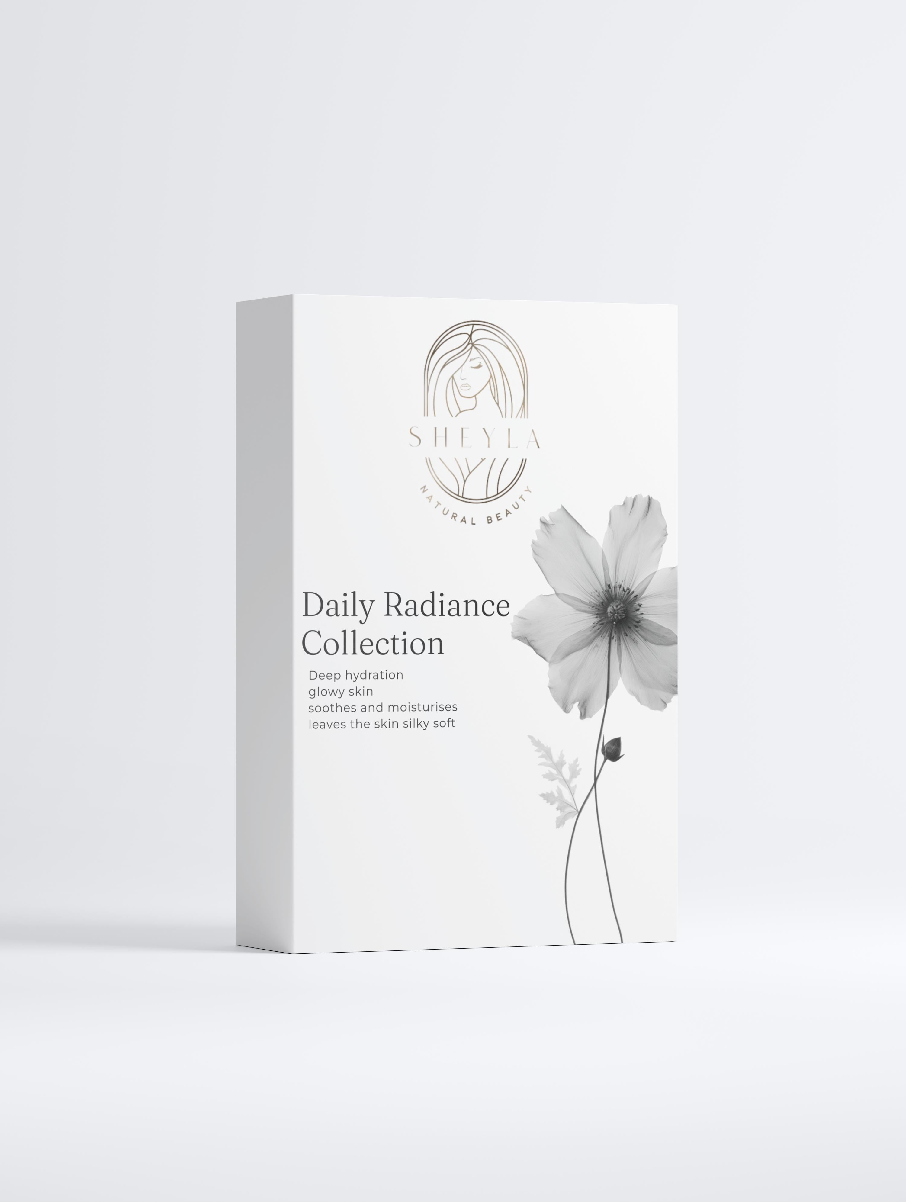 Daily Radiance Collection schwarze Schrift weiße Verpackung mit Blüten drauf Gold Logo und weißer Hintergrund