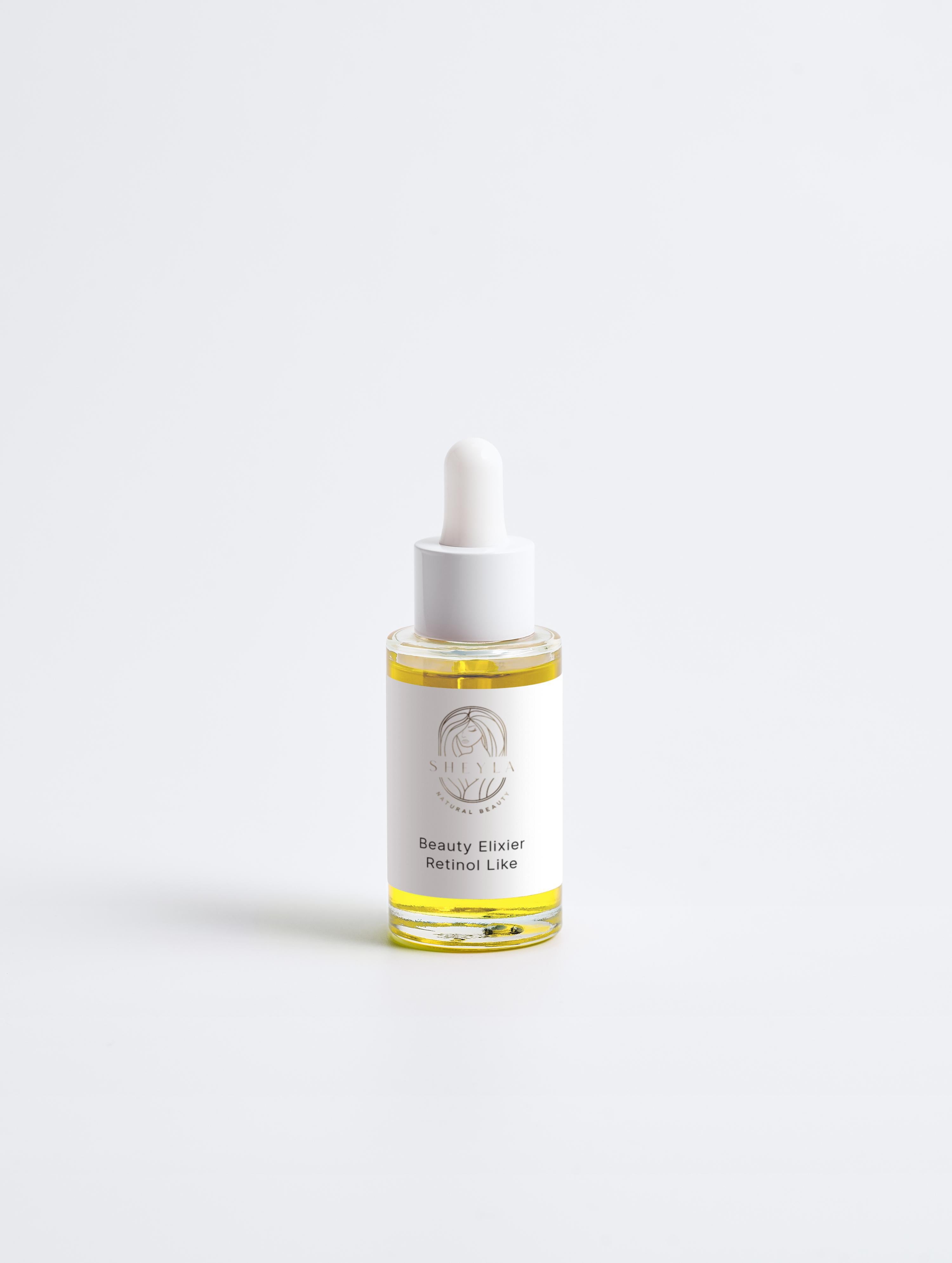Beauty Elixier Retinol-Like von Sheyla – kleine Glasflasche mit weißer Pipette und passender Produktverpackung, auf hellem Hintergrund präsentiert