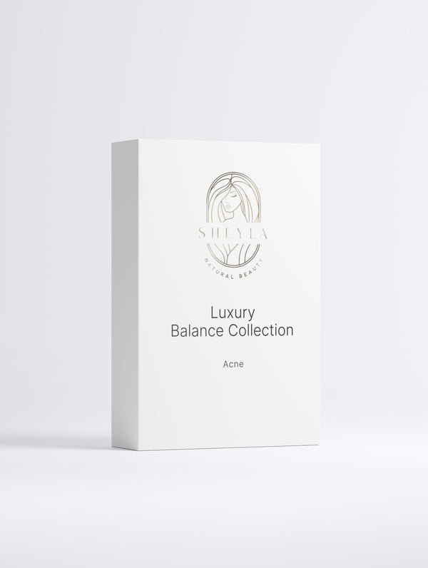 Luxury Balance Set Acne von Sheyla – Pflegeset gegen unreine Haut mit Reinigungsschaum, AHA-Peeling-Serum und Spotpflege, dekorativ vor hellem Hintergrund präsentiert